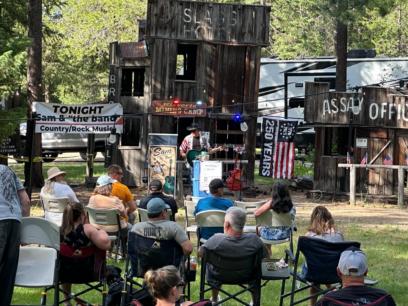 Sam performing and audiences enjoying live music